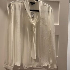 Never worn cream blouse